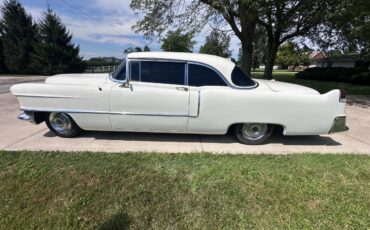Cadillac-coupe-deville-1955