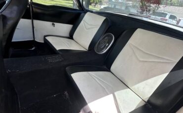 Cadillac-coupe-deville-1955-5