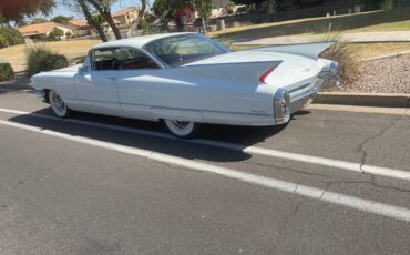 Cadillac-coupe-deville-1960-white-1