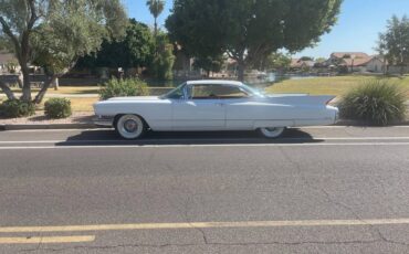 Cadillac-coupe-deville-1960-white