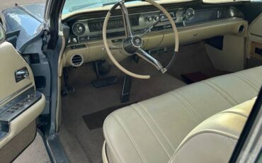 Cadillac-coupe-deville-1962-blue-11