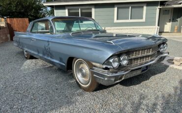 Cadillac-coupe-deville-1962-blue