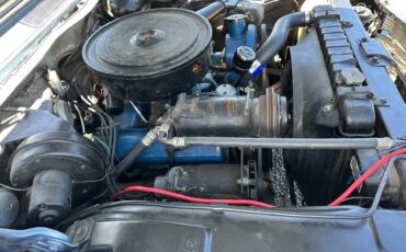 Cadillac-coupe-deville-1962-blue-8