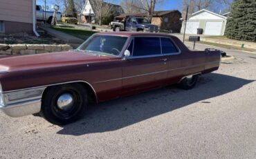 Cadillac-coupe-deville-1965-1