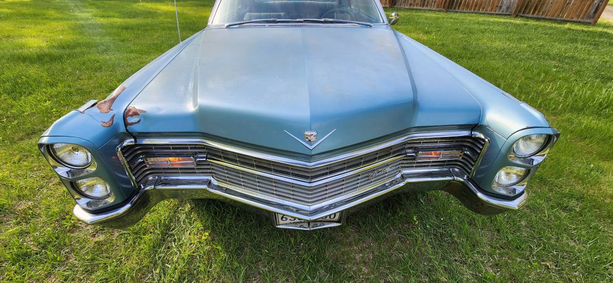 Cadillac-coupe-deville-1966-8