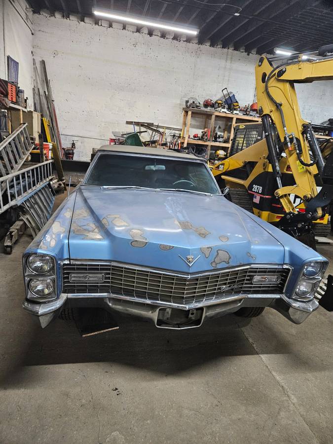 Cadillac-coupe-deville-1967-blue