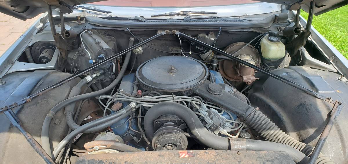 Cadillac-coupe-deville-1976-grey-14
