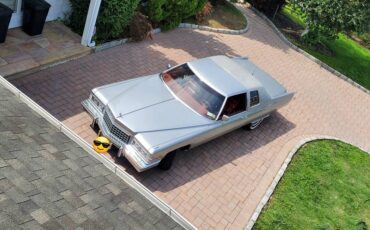 Cadillac-coupe-deville-1976-grey-17