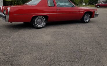 Cadillac-coupe-deville-1977-red-10