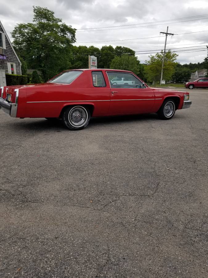Cadillac-coupe-deville-1977-red-10