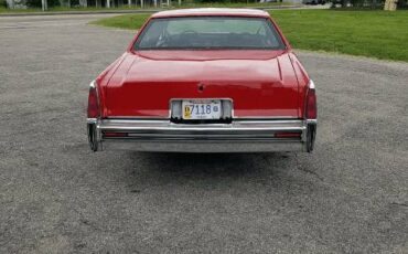 Cadillac-coupe-deville-1977-red-6