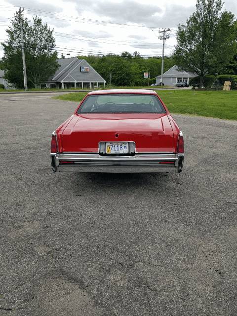 Cadillac-coupe-deville-1977-red-6