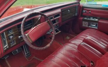 Cadillac-coupe-deville-1977-red-8
