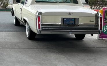 Cadillac-coupe-deville-1981-yellow-1