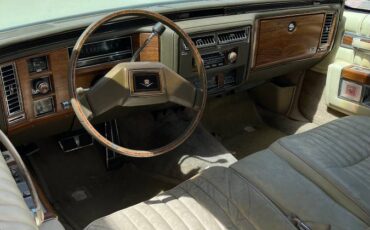 Cadillac-coupe-deville-1981-yellow-2
