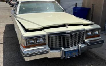 Cadillac-coupe-deville-1981-yellow-4