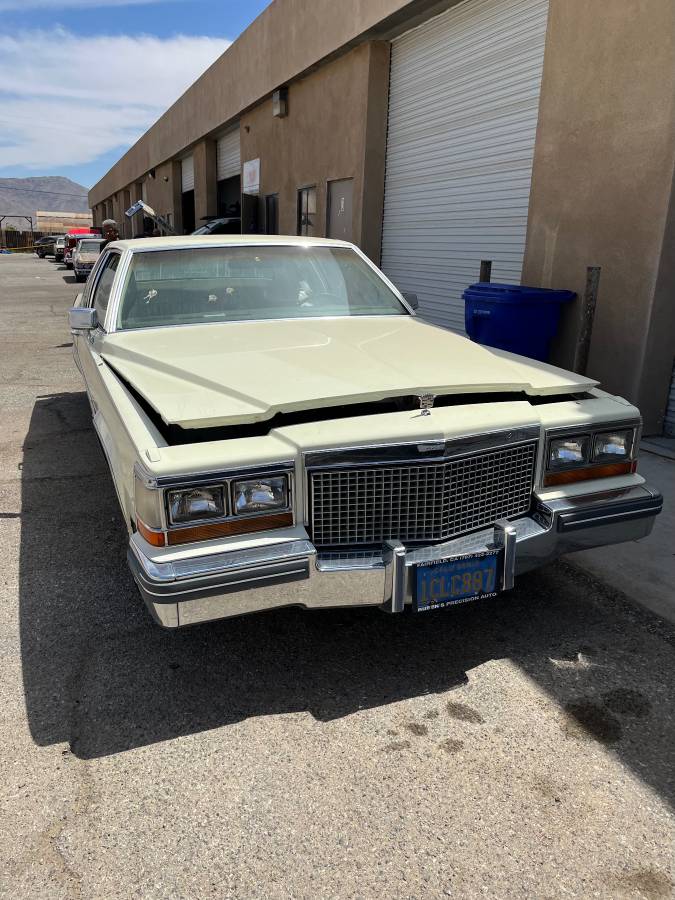 Cadillac-coupe-deville-1981-yellow-4
