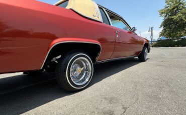 Cadillac-coupe-deville-1983