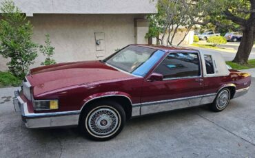 Cadillac-coupe-deville-1989-red