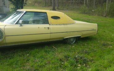 Cadillac-deville-1976-yellow-3