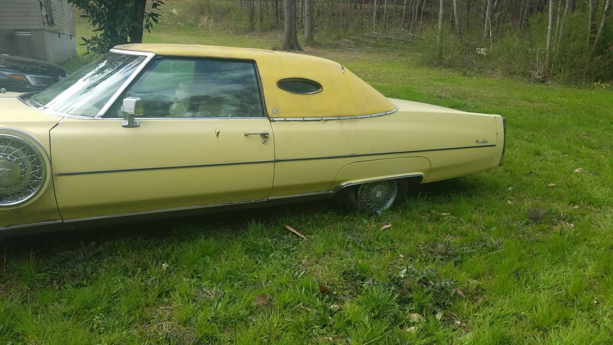 Cadillac-deville-1976-yellow-3