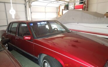 Cadillac-deville-sedan-4-door-1990-red-2