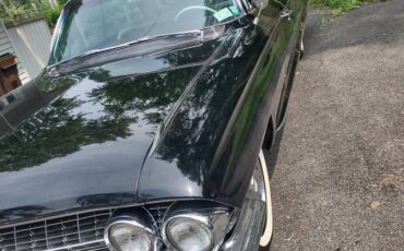 Cadillac-fleetwood-1961-black-11
