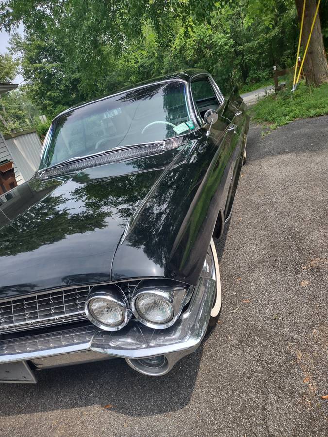 Cadillac-fleetwood-1961-black-11