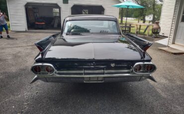 Cadillac-fleetwood-1961-black-4