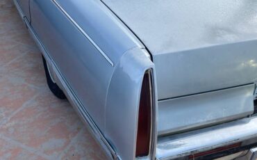 Cadillac-fleetwood-brougham-1995-blue-1