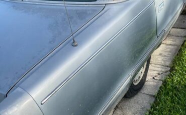 Cadillac-fleetwood-brougham-1995-blue