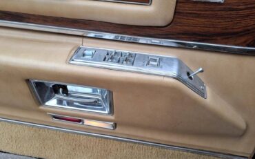 Cadillac-sedan-deville-1976-yellow-12