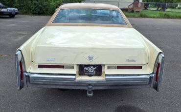 Cadillac-sedan-deville-1976-yellow-19
