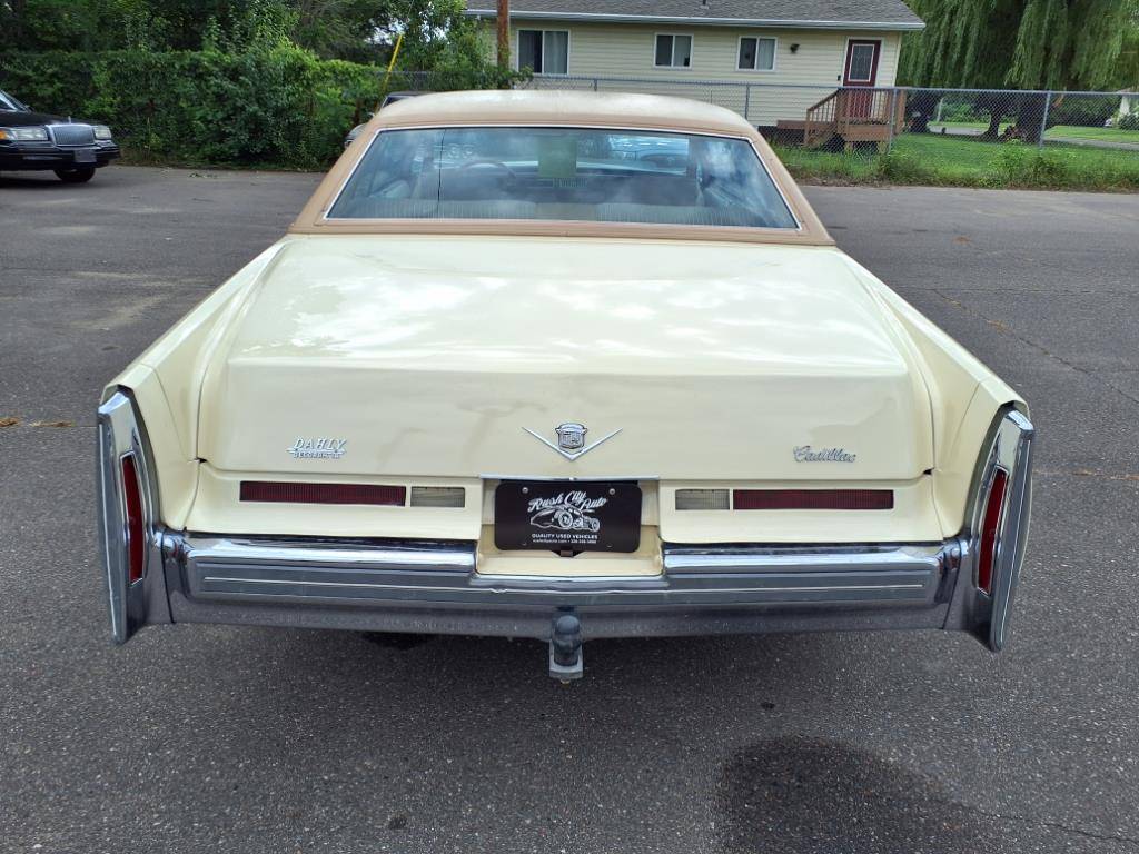 Cadillac-sedan-deville-1976-yellow-19