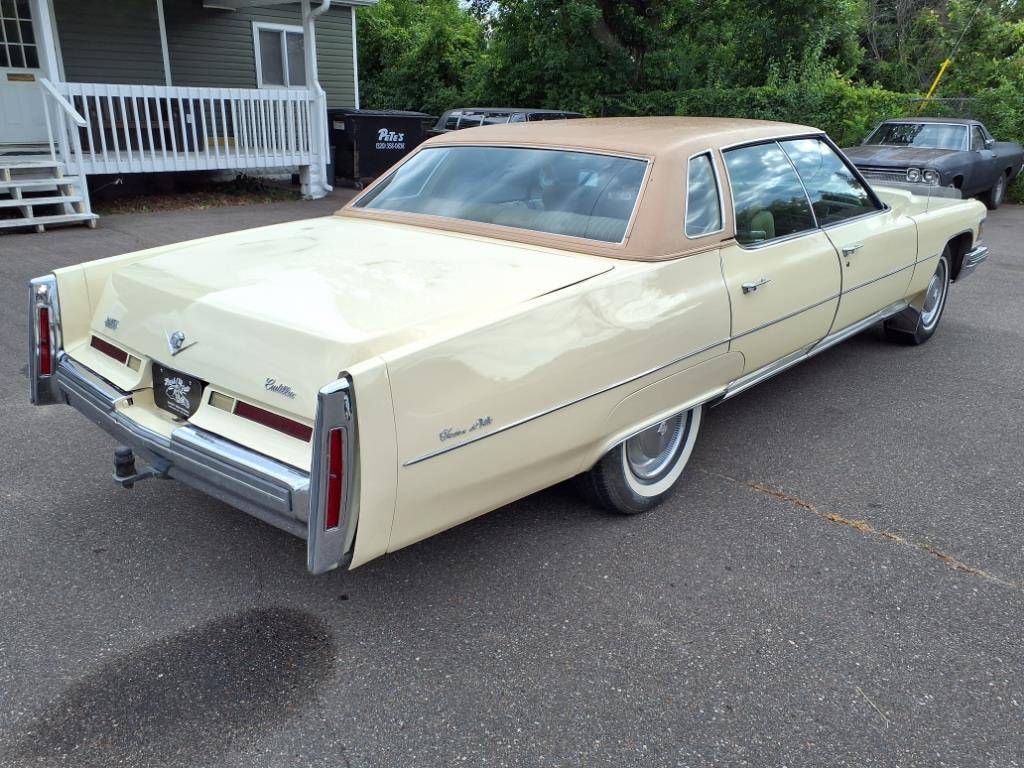 Cadillac-sedan-deville-1976-yellow-2