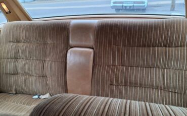 Cadillac-sedan-deville-1976-yellow-3