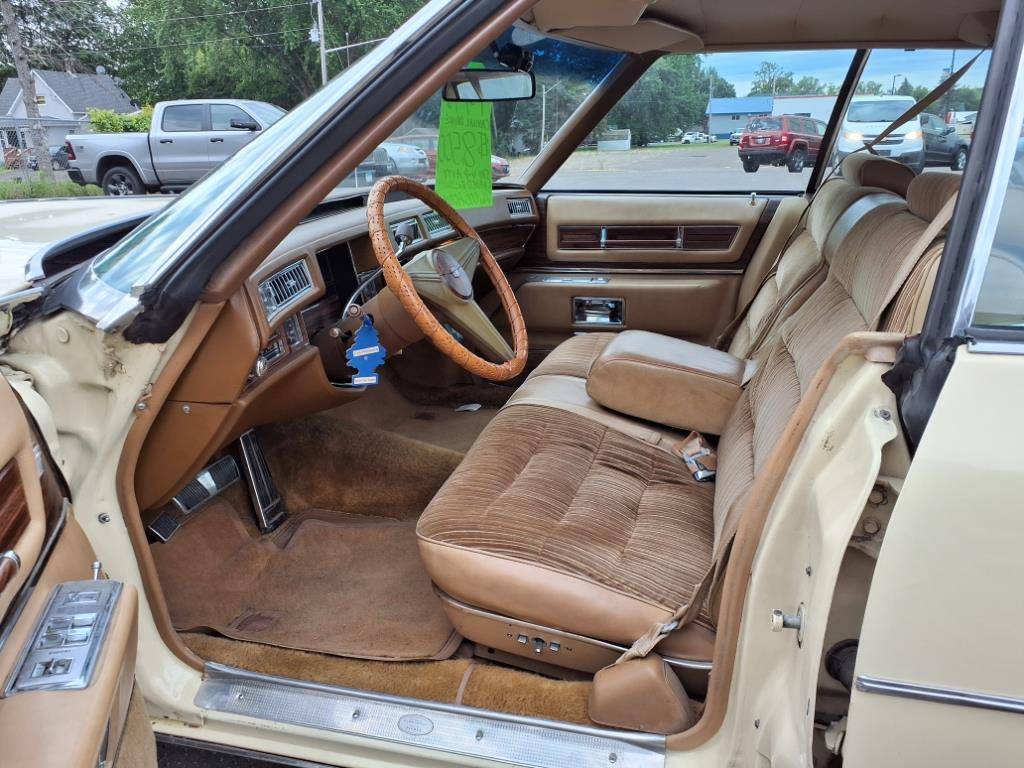 Cadillac-sedan-deville-1976-yellow-7
