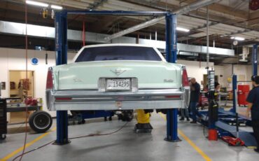 Cadillac-sedan-deville-1977-green-12