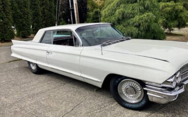 Cadillac-series-62-coupe-de-ville-1962-white