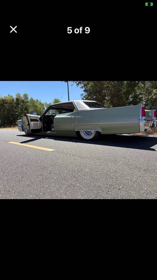 Cadillac-seville-sedan-4d-1969-green-2