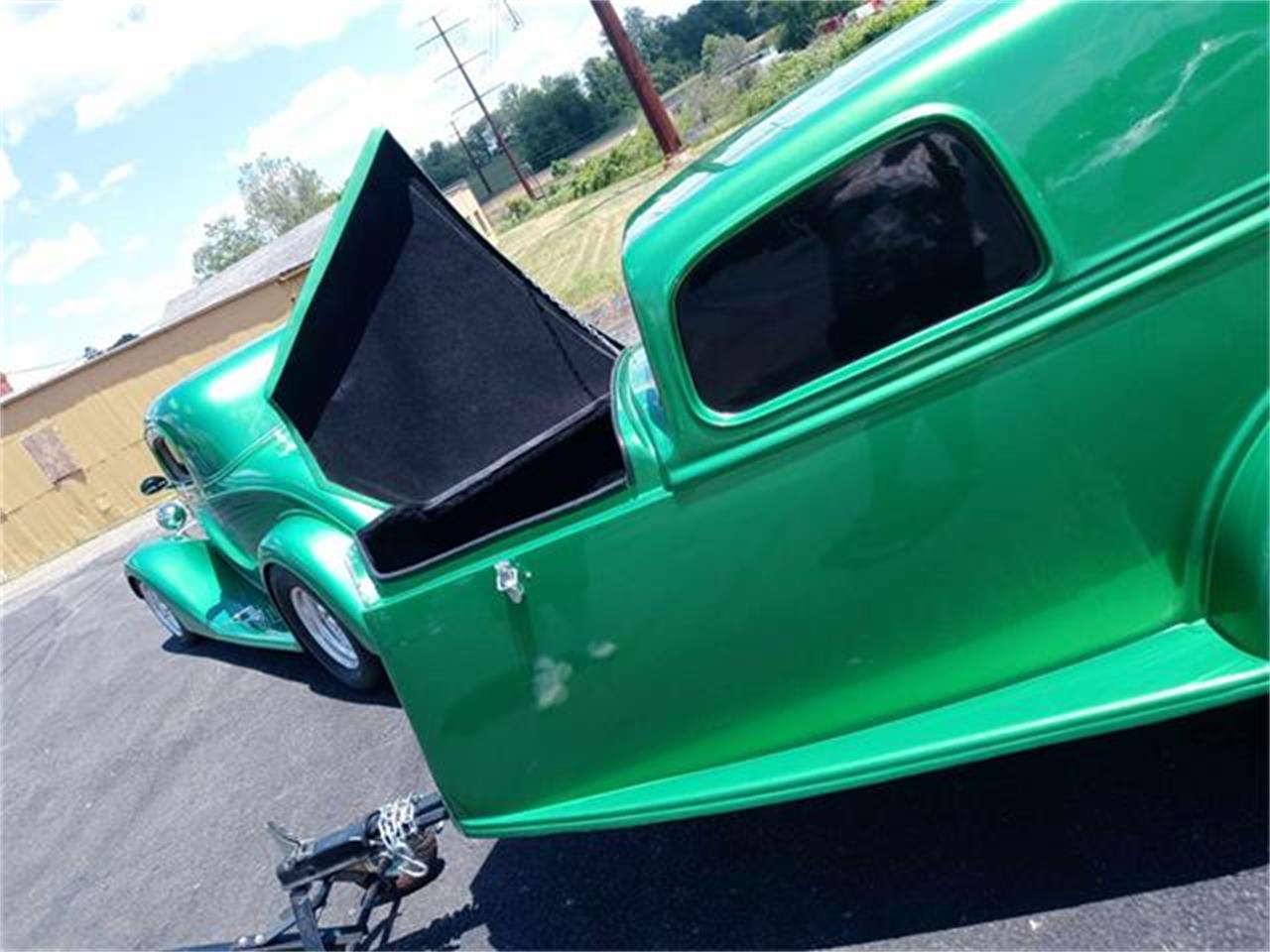 Chevrolet-3-window-coupe-1934-ELEC.-LIMETIME-GREEN-TAN-11