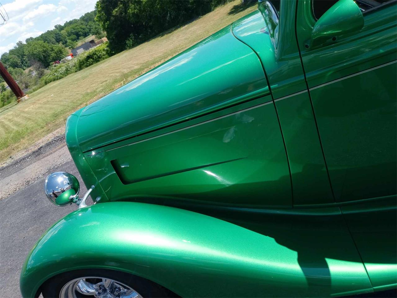 Chevrolet-3-window-coupe-1934-ELEC.-LIMETIME-GREEN-TAN-15