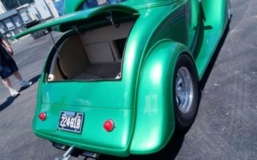 Chevrolet-3-window-coupe-1934-ELEC.-LIMETIME-GREEN-TAN-16