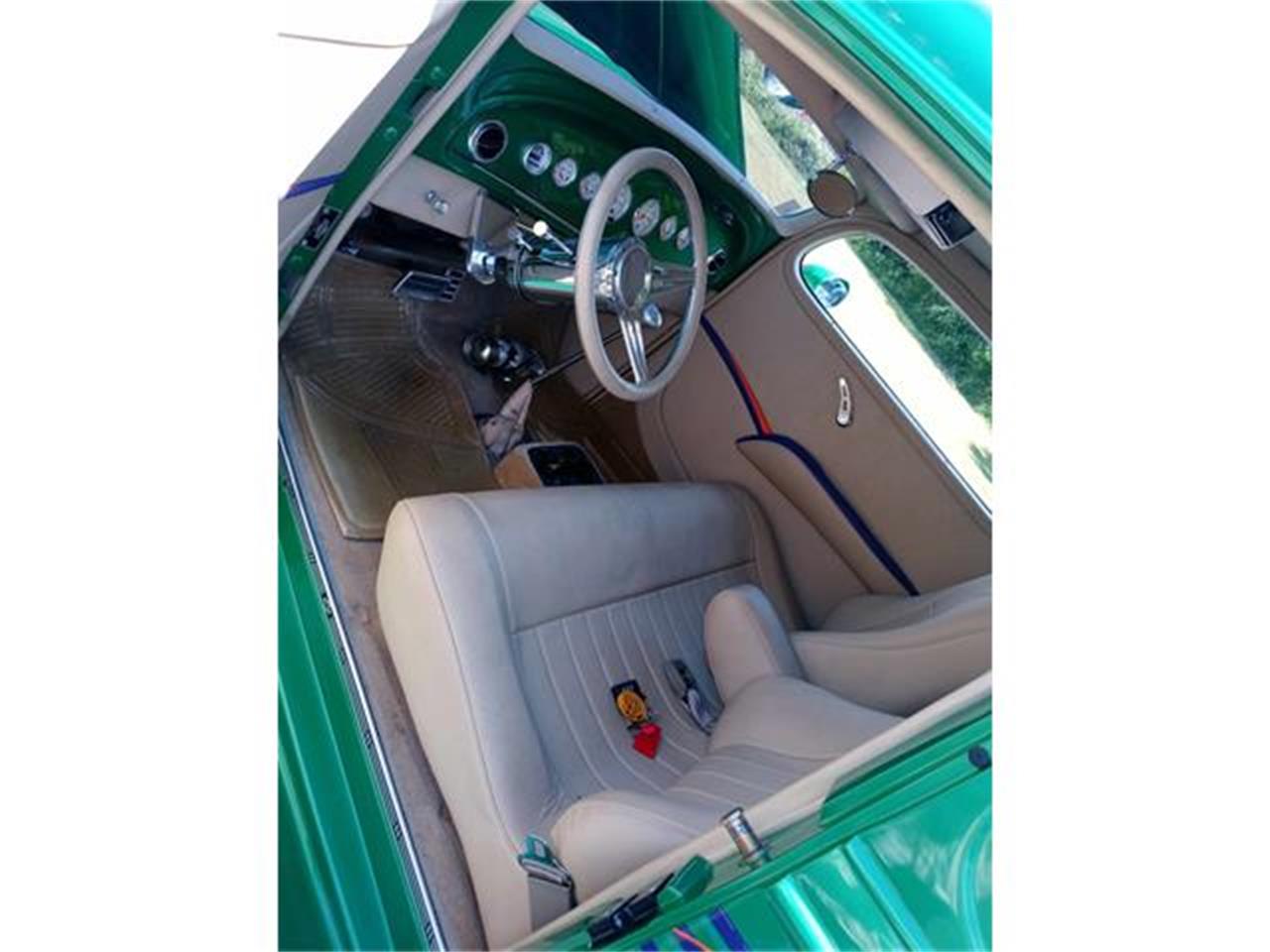 Chevrolet-3-window-coupe-1934-ELEC.-LIMETIME-GREEN-TAN-5