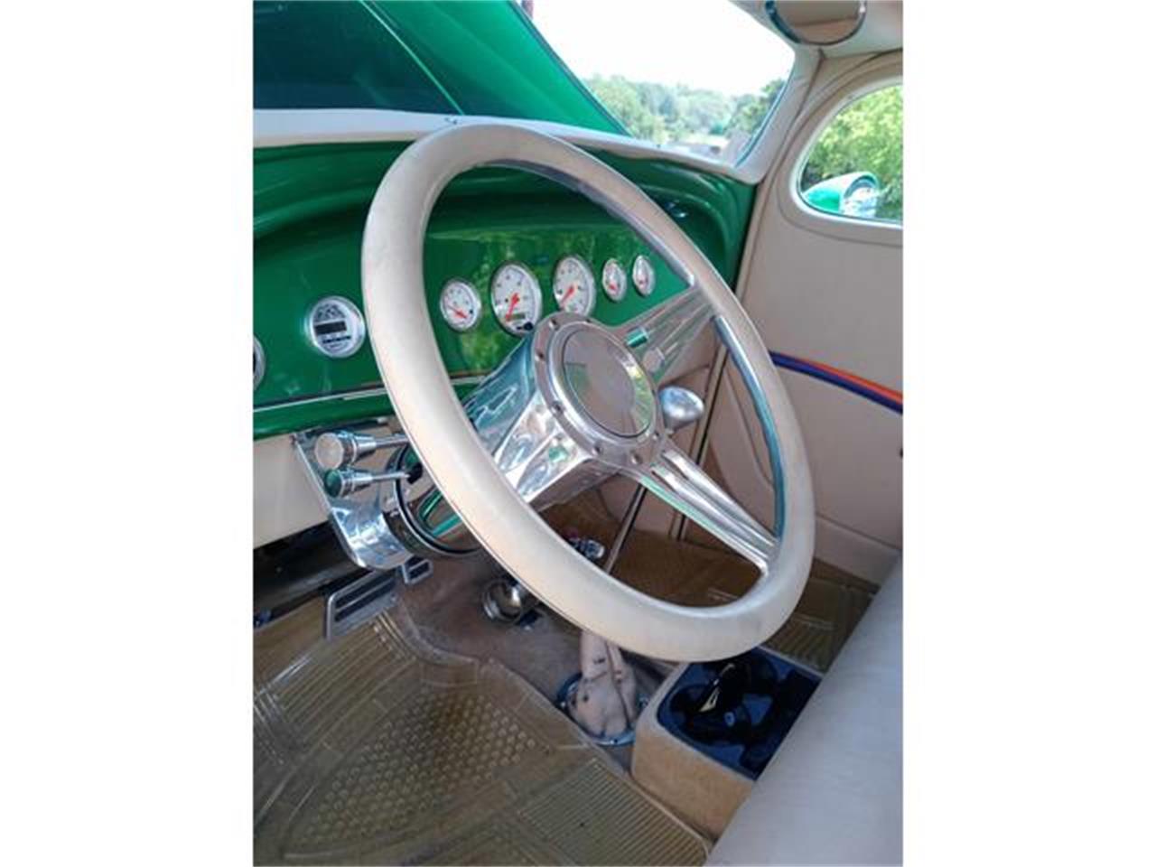 Chevrolet-3-window-coupe-1934-ELEC.-LIMETIME-GREEN-TAN-7