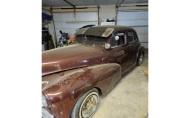 Chevrolet-4-dr-sedan-1948-maroon-maroon-grey-1