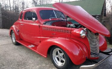 Chevrolet-5-window-coupe-1938-Red-TanRed-3