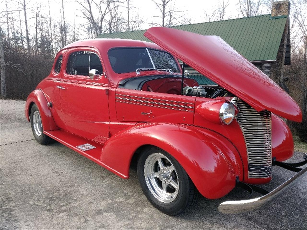 Chevrolet-5-window-coupe-1938-Red-TanRed-3