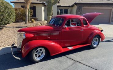 Chevrolet-5-window-coupe-1938-Red-TanRed