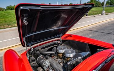 Chevrolet-Corvette-1957-Venetian-Red-Polo-White-Red-16
